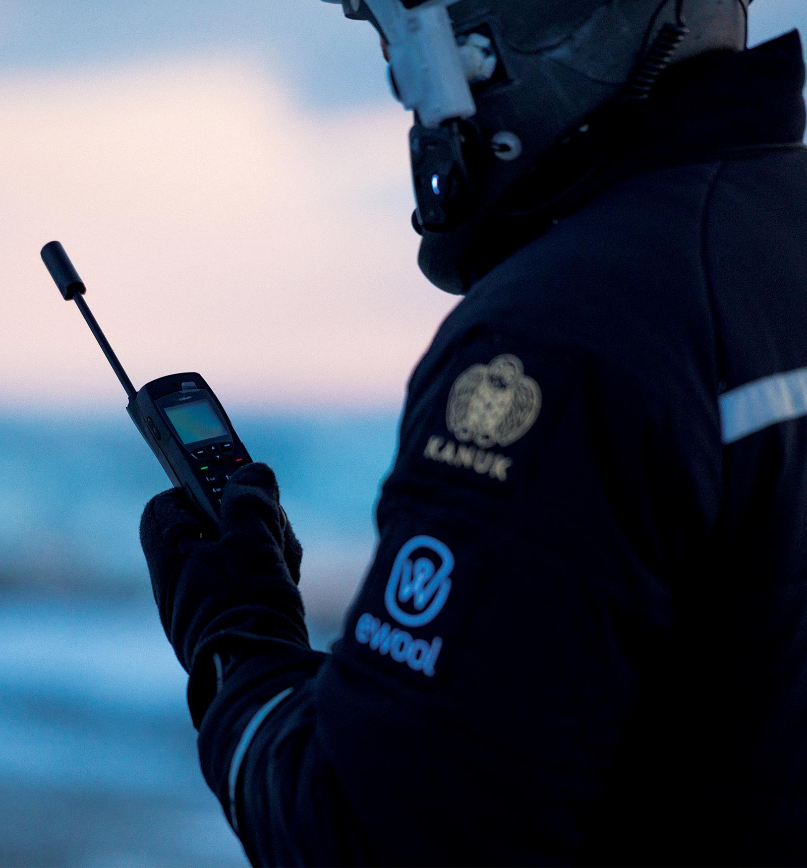 Lunark Expedition member holding Iridium 9555